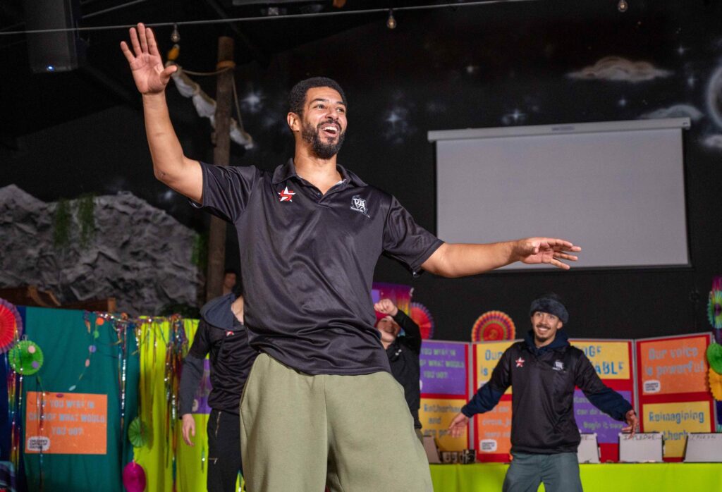 Young man performs for a crowd